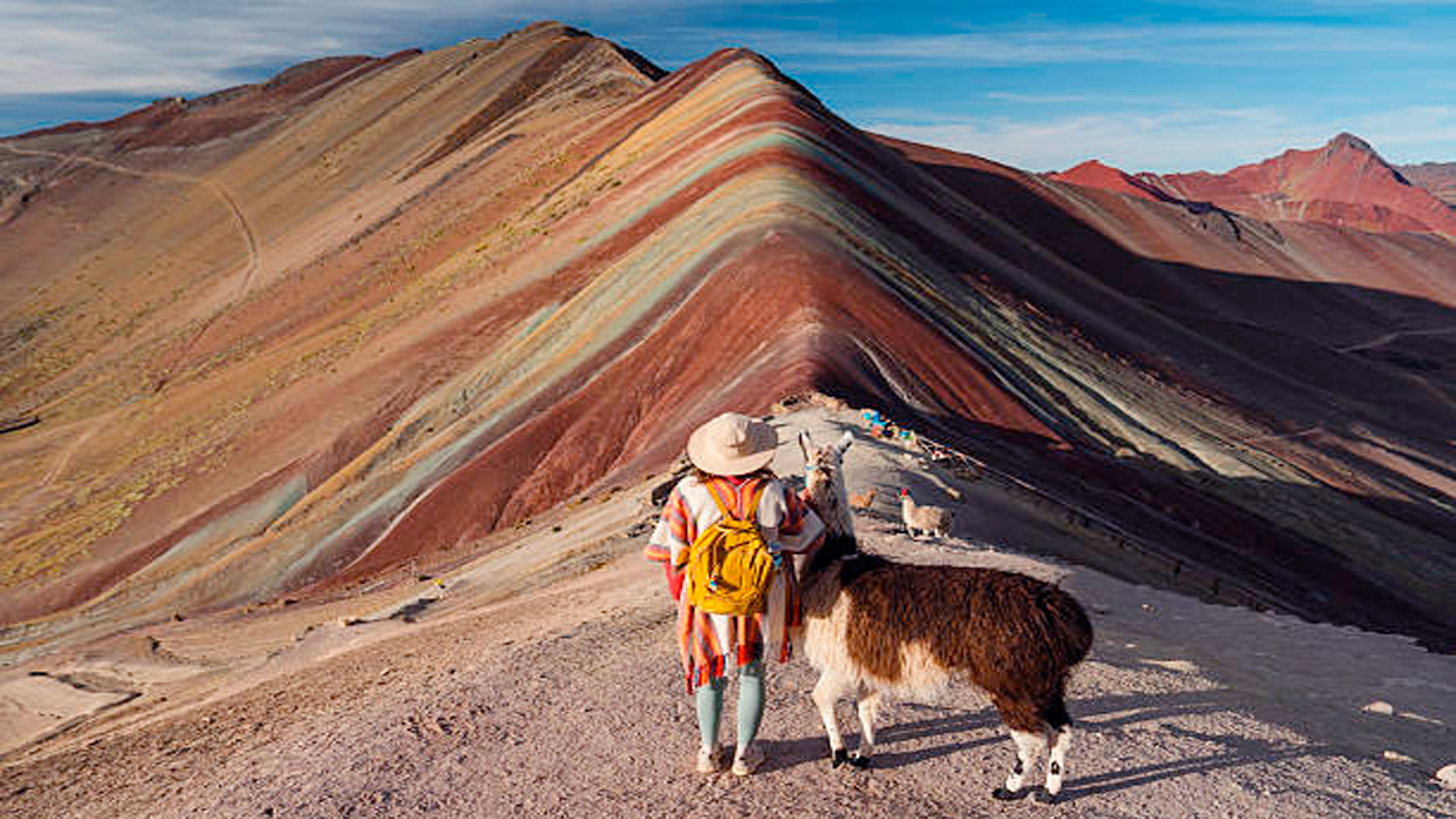 Palcoyo Rainbow Mountain alternative scenic route with three colorful ranges and stone forest in Peru